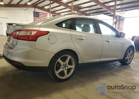 2013 Ford Focus Titanium z USA, uszkodzony, nr VIN 1FADP3J24DL216328